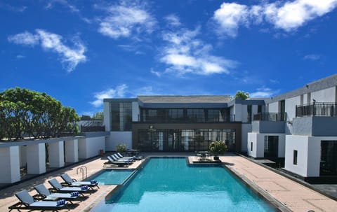 Outdoor pool, open 7:00 AM to 7:00 PM, pool umbrellas, sun loungers