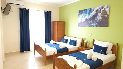 Standard Room, 1 Bedroom, Kitchenette, Sea View | Free WiFi, bed sheets