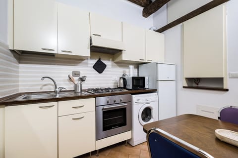 Apartment | Private kitchen | Espresso maker, coffee/tea maker, electric kettle, dining tables