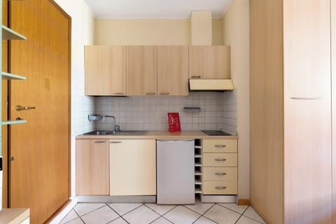 Espresso maker, electric kettle, dining tables