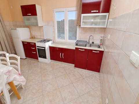 House (Four bedroom Holiday Home with Terrac) | Private kitchen | Fridge
