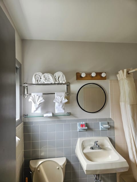 Basic Single Room, 2 Double Beds, Non Smoking | Bathroom | Hair dryer, towels