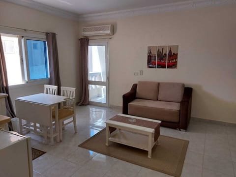 Deluxe Studio, Balcony, Pool View | Iron/ironing board, WiFi
