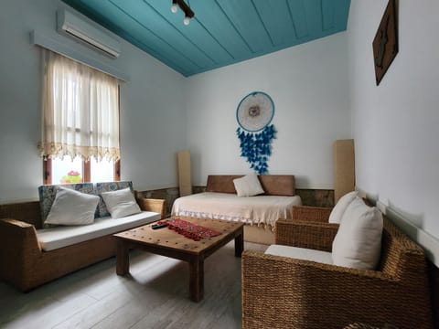 Exclusive Villa, Non Smoking, Garden Area | Living area | 130-cm LCD TV with satellite channels