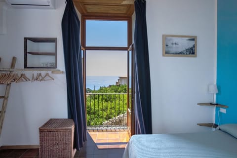 Premium Quadruple Room, 2 Double Beds, Sea View | Balcony