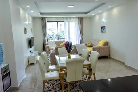 Executive Apartment, Balcony, City View | Living area | 32-inch Smart TV with digital channels