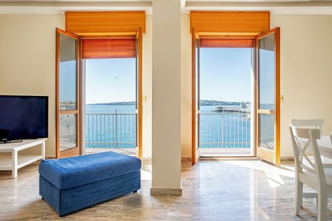 Apartment, Beach View | Living room | 35-inch TV with digital channels