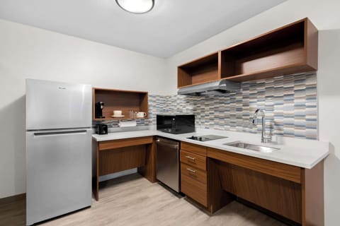 Suite, 1 King Bed, Non Smoking (Accessible Tub) | Private kitchen | Coffee/tea maker