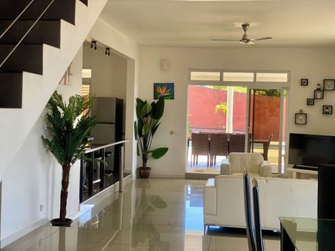 Villa, Lagoon View | Living area | Flat-screen TV