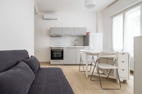 Apartment | Living area | 35-inch flat-screen TV with digital channels