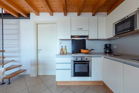 Apartment, Pool View | Shared kitchen | Electric kettle, toaster, highchair