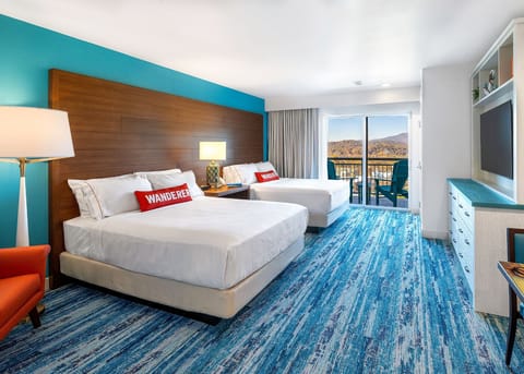 Premium bedding, down comforters, pillowtop beds, in-room safe