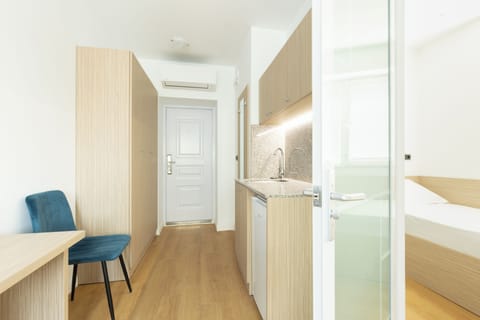 Classic Studio Suite, 2 Bedrooms, Non Smoking, City View | Desk, laptop workspace, free WiFi, bed sheets