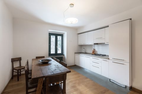 Apartment | Private kitchen | Fridge, microwave, stovetop, highchair