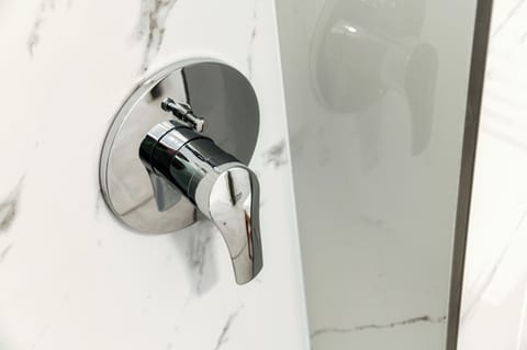 Deluxe Double Room, Lake View | Bathroom | Shower, hair dryer, slippers, towels