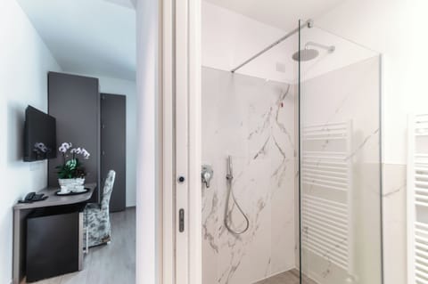 Basic Double Room, Mountain View | Bathroom | Shower, hair dryer, slippers, towels