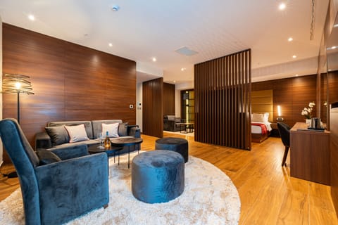 Suite, Balcony, Lake View | Minibar, in-room safe, desk, blackout drapes