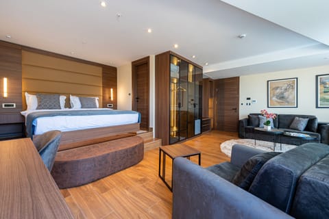 Suite, Balcony, Lake View | Minibar, in-room safe, desk, blackout drapes