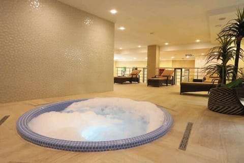 Sauna, hot tub, steam room, hot stone massages, sports massages
