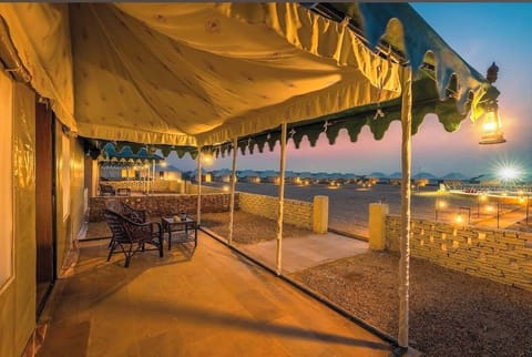 Classic Tent, Balcony, Desert View | Living area | Fireplace, heated floors, offices