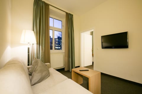 Junior Suite, Multiple Beds | In-room safe, desk, soundproofing, iron/ironing board
