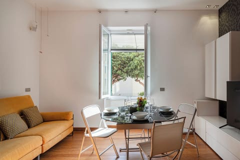 Apartment | Living area | 30-inch flat-screen TV with digital channels