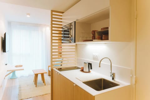 Deluxe Studio | Private kitchen | Mini-fridge, microwave, stovetop, electric kettle