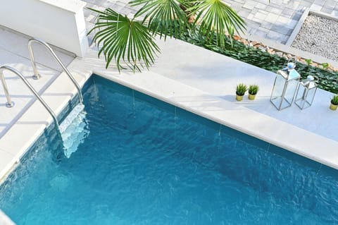 Seasonal outdoor pool, sun loungers