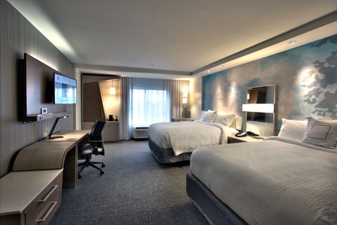 Room, 2 Queen Beds | Desk, blackout drapes, iron/ironing board, free rollaway beds