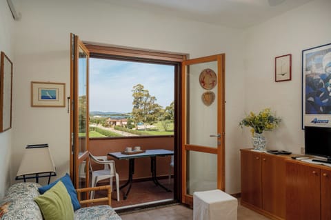 Apartment, Balcony | Living area | 32-inch TV with digital channels