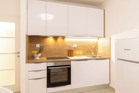 Apartment | Private kitchen | Fridge, oven, stovetop, dishwasher