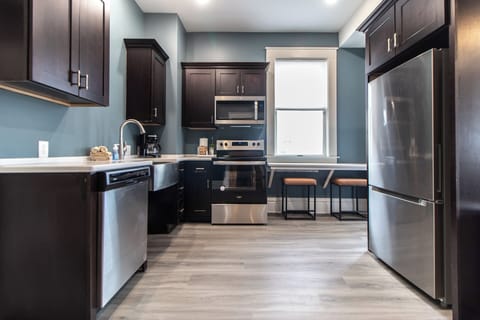 One Bedroom Apartment Unit 2 | Private kitchen | Full-size fridge, microwave, oven, stovetop