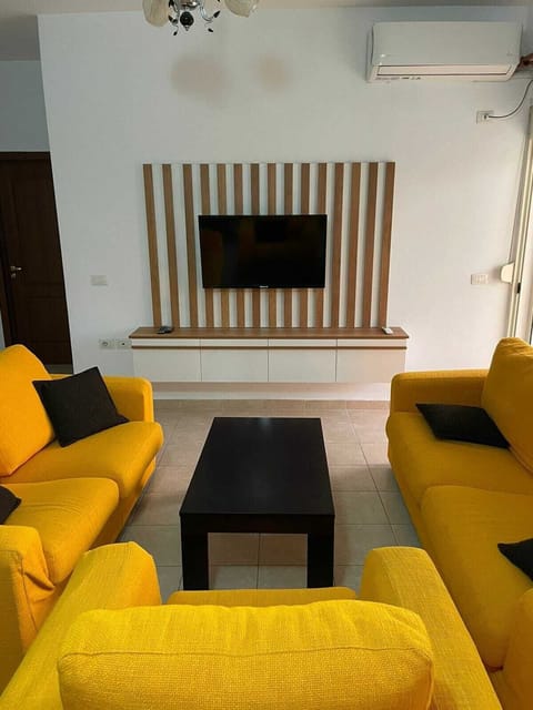 42-inch flat-screen TV with satellite channels, TV