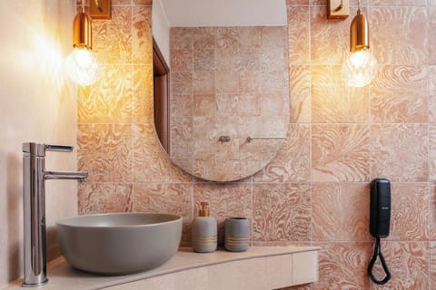 Junior Suite, Ground Floor | Bathroom | Shower, hair dryer, bathrobes, slippers