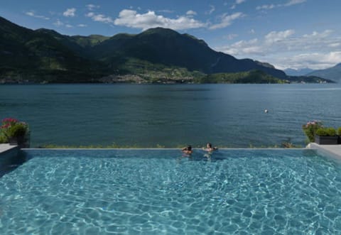 Seasonal outdoor pool, pool umbrellas, sun loungers