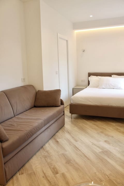 Deluxe Studio, 1 Double Bed with Sofa bed, Balcony, Hill View | Living area | 36-inch Smart TV with digital channels, Netflix, streaming services