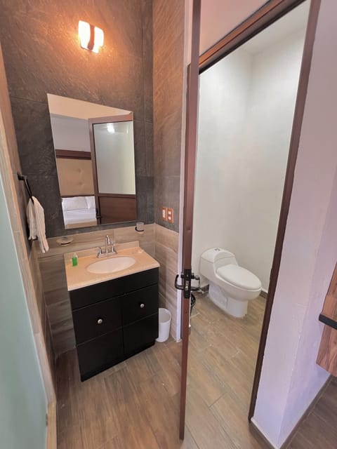 Basic Quadruple Room, Garden View | Bathroom