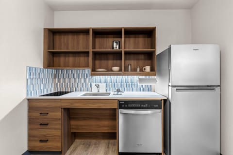 Suite, 1 Queen Bed, Non Smoking | Blackout drapes, free WiFi, bed sheets