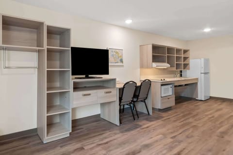 Desk, laptop workspace, bed sheets