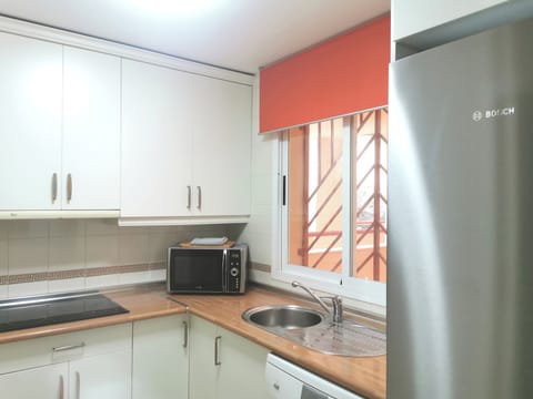 Apartment | Private kitchen | Fridge, microwave, stovetop, dishwasher