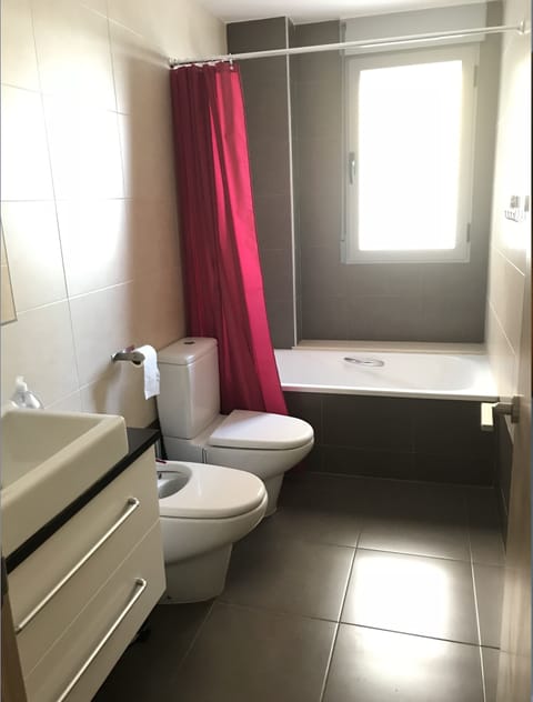 Apartment | Bathroom | Combined shower/tub, deep soaking tub, towels, toilet paper