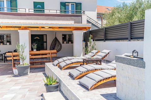 Family House, Multiple Bedrooms, 2 Bathrooms (Holiday Home Luce with Pool) | Outdoor dining