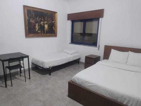 Deluxe Triple Room, 1 Bedroom | Desk, soundproofing, iron/ironing board, free WiFi