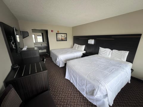 Standard Double Room | Desk, laptop workspace, blackout drapes, iron/ironing board