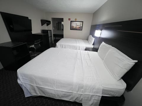 Standard Double Room | Desk, laptop workspace, blackout drapes, iron/ironing board