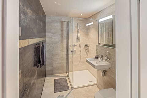 Comfort Double Room | Bathroom | Shower, hair dryer, slippers, towels