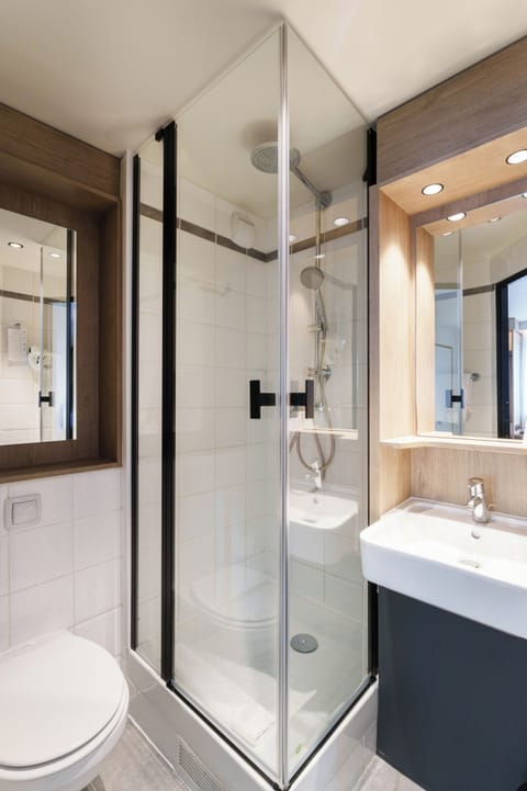 Eco-friendly toiletries, hair dryer, towels