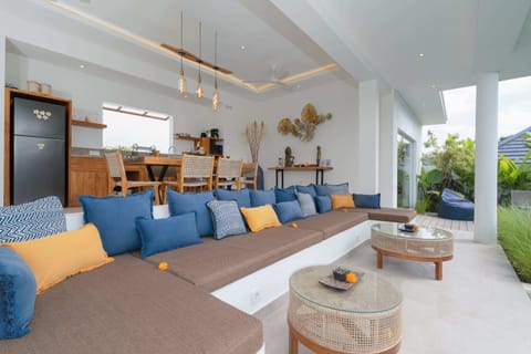 Basic Villa | Living area | 32-inch Smart TV with digital channels, streaming services