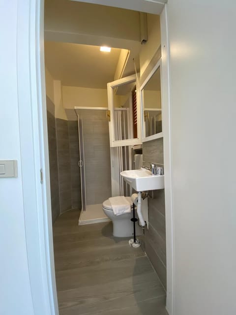 Classic Matrimonial, Multiple Beds, Sea View | Bathroom | Shower, soap, shampoo, toilet paper