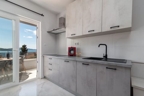 Superior Penthouse, 2 Bedrooms, Sea View | Private kitchen | Fridge, microwave, oven, stovetop